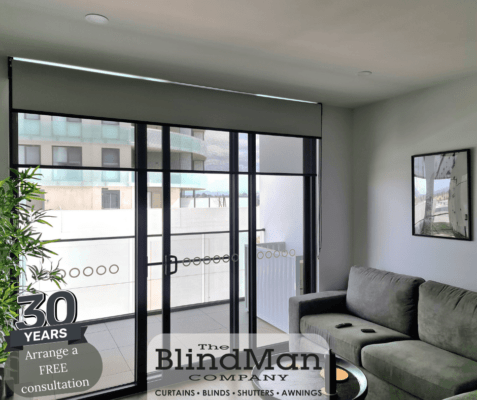 Grey roller blinds on door