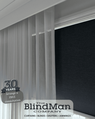 Light grey roller blinds with light grey curtains