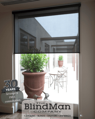 Roller blinds in black mesh