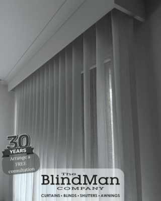 Roller blinds with grey curtains