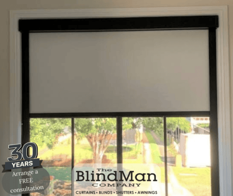 White roller blinds with black trimming